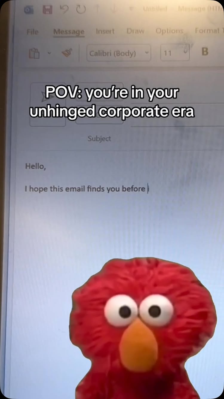 The cover image shows a computer screen displaying an email interface. A text overlay states "POV: you're in your unhinged corporate era." Below the email, the red face of the Elmo character is added, humorously juxtaposed with the professional context.