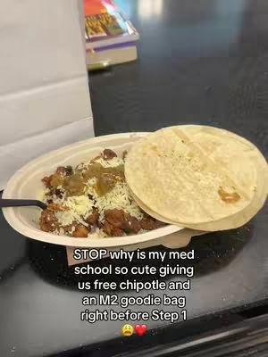 A close-up shot of a plate of food, with tortillas on the side, is shown on a dark surface. There's text overlayed on the image.