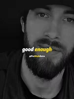 A black and white photo of a man's face, the focus is on his upper chest to the top of his head. The text overlay reads "good enough". The man has a beard and is wearing a cap.