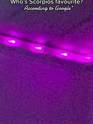 The image features a close-up view of a dark purple surface, possibly fabric. Across the upper portion, a curved, lighted strip with five white lights is visible. The lights appear to be part of an LED strip, emitting a bright pink glow. Text is overlaid at the top, written in a sans-serif font.
