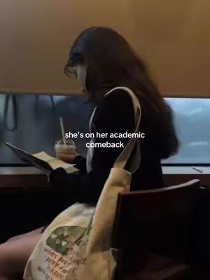 A person is sitting at a table, reading a book while holding a drink. Text overlayed indicates this is an academic comeback.
