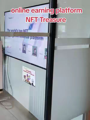 The cover image shows a large television screen displaying the interface of a platform, possibly an NFT marketplace or online earning site. The screen is positioned between two glass panels, and a sticker is on one of the panels. Overlay text are placed on the cover image to serve as a hook, with black vertical support.