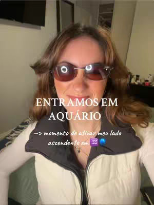 A selfie-style video cover image featuring a woman with brown hair and sunglasses. Text overlays in white are positioned across her face, with additional text at the bottom. The woman is wearing a white top and a black vest, and the setting appears to be indoors.