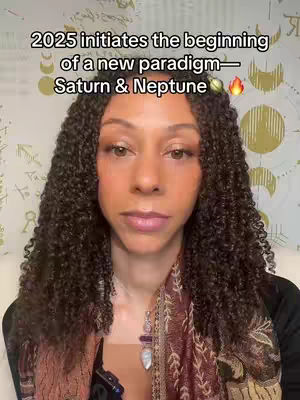 A woman with curly dark hair looks directly at the camera. She's wearing a shawl and a necklace. Text overlays the image with information about 2025 and Saturn & Neptune.