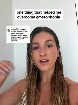 A woman with long brown hair is framed from the shoulders up, facing the camera and talking. A white text overlay at the top reads, 'one thing that helped me overcome emetophobia'. A comment on a transparent box, with a profile pic, adds to the context on the left.