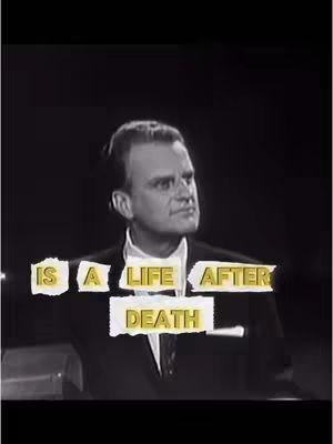 A black and white image featuring a middle-aged man in a suit, looking slightly up and to his right. Text overlays are placed over the image.