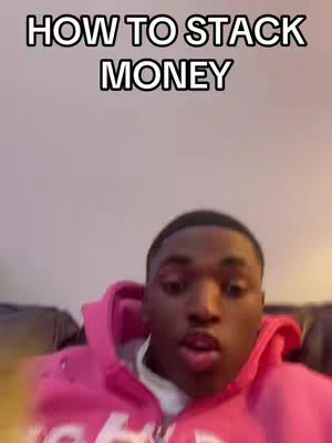The cover image shows a close-up of a young Black man with a pink hoodie talking to the camera. The overlay text at the top of the image reads "HOW TO STACK MONEY."