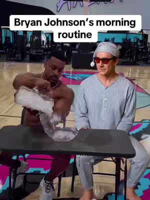 A split image showing two men. On the left, a shirtless man is pouring ice over what appears to be a folded table. On the right, a man in pajamas and sunglasses sits. The text overlay reads 'Bryan Johnson's morning routine'. The background shows a gym setting.