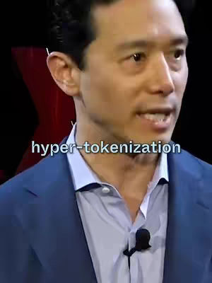 The image features a man in a blue blazer and a light-colored dress shirt speaking at an event. The text "hyper-tokenization" is overlaid at the bottom of the image.