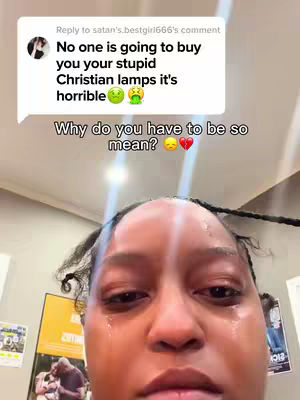 A close-up of a person's face, primarily showing her eyes and face as she cries. Text bubbles from a comment appear above her, along with an overlaid question. The composition is centered on the face against a generic indoor backdrop. The overall tone is emotional.