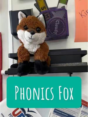 The cover image displays a plush fox toy with brown and white fur against a white background. Below the fox, a green rectangular text box displays the words "PHONICS FOX" in white, sans-serif font. The overall composition is simple, with a focus on the toy and text.