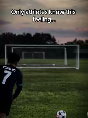 A person in a soccer uniform, with the name 'RONALDO' and number 7 visible, stands facing away from the camera on a grassy field. A soccer ball is at the bottom of the frame, and the background features a soccer goal and a cloudy sky with the colors of dusk.