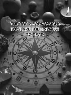 The image is a black and white photo featuring a compass rose at the center of an old, worn surface and around it are a variety of objects, including crystals, candles, and small, round items. The compass rose itself is detailed, with directional markers in elegant script. Surrounding the central design are the numerals of a clock face, as well as text which looks to be in an older script. Above the compass is a text overlay that says "THE TOP 2 ZODIAC SIGNS THAT ARE THE HARDEST TO READ".