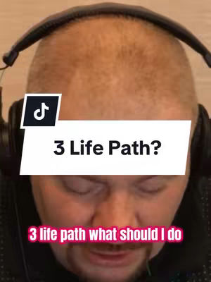 The cover image features a man wearing headphones, with text overlays. The man is positioned from the chest up, and is looking down with a slight smile, with overlayed text at the bottom saying, “3 life path what should I do“. A black and white TikTok like logo can be seen on top.