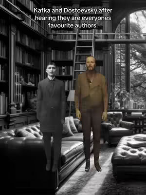 A black and white photo depicts two men standing side-by-side in a library setting. The room is filled with bookshelves, a tall ladder, and a large window looking out onto a tree. The man on the left is dressed in a dark coat while the man on the right is wearing more casual attire. The text overlay at the top of the image reads: "Kafka and Dostoevsky after hearing they are everyone's favorite authors:".