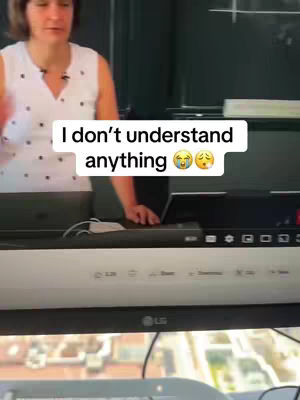 A woman stands in front of a screen that is displaying the image. Text overlayed: "I don't understand anything" and crying emojis.