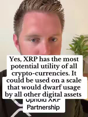 A selfie-style shot featuring a fair-skinned man, framed from the chest up, against a slightly blurred background. The man has short hair and appears to be indoors, likely in front of a neutral-toned wall or setting. A text overlay in a white rectangular box in the middle of the frame covers part of his face, with the top of the text reaching his eyes and the bottom of the text barely covering his chest. The lighting seems to be natural or well-distributed, illuminating his face evenly. A plant peeks out of the background.