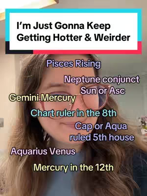 A selfie-style shot of a person with long brown hair and glasses. The focus is on the person's face, with overlay text providing astrological information.