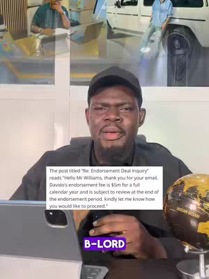 The cover image shows a man in a black shirt and a black cap, positioned slightly off-center with a serious expression. Behind him are blurred elements of a well-lit interior, including a laptop and globe. A text overlay includes a quote about Davido's endorsement fees and a purple bar with the name 'B-LORD'.