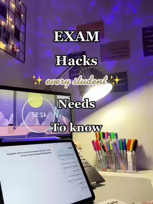 The cover image shows a well-lit desk with a laptop, a tablet, and a pen holder with colorful pens. The tablet is angled towards the viewer, displaying text, while the laptop is positioned behind it with a glowing screen. A wall is in the background, decorated with a photo organizer and aesthetic elements, creating a study-oriented environment.