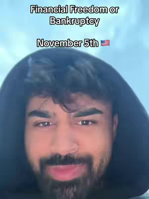 A man in a black hoodie looks directly at the camera against a blue sky background. Text overlayed on the image reads, 'Financial Freedom or Bankruptcy,' followed by 'November 5th' and a small American flag.