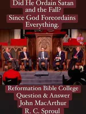 The cover image is a promotional shot for a theological discussion. It features a group of six men of different ages in suits and ties, seated on stage with a backdrop that suggests a church or conference hall. The central figures are prominent, with text overlays at the top and bottom. The color scheme is warm, with dark backgrounds and text.