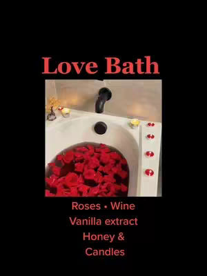 A bathroom scene features a white bathtub filled with red rose petals, appearing to be a bath designed for self-love or ritual. Several small candles, both white and red, are placed on the rim of the tub. The words "Love Bath" appear in red at the top over this scene. Below the tub, a list of ingredients (Roses, Wine, Vanilla extract, Honey, and Candles) are featured in the center.