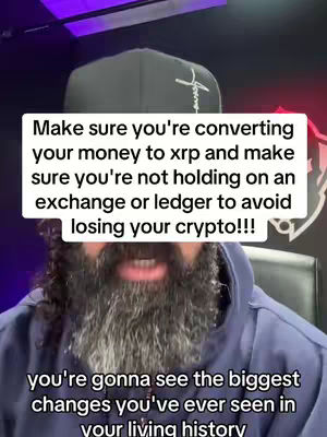 A man with a beard wearing a black cap and a blue hoodie, the image is a selfie and positioned in front of a low-lit background with a superimposed text overlay.