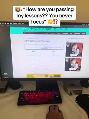 The cover image shows a computer monitor displaying a website related to physics and maths tutoring. Above the screen, there's a text overlay with a speech bubble featuring a question about how the person is passing lessons, mentioning they never focus. The background includes a keyboard with red illuminated keys, other computer components, and a bed sheet. The overall composition is a screenshot of a computer screen with overlay text.