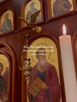 A religious setting with multiple arched wall carvings frames a central figure, whose face is blurred. A lit candle and ornate hanging adornments add to the spiritual ambiance. Text is overlaid, providing context with a religious message in a stylized font.