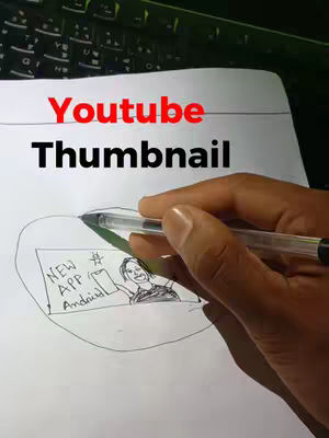 A hand holding a pen sketches a rough design on a piece of paper, with a keyboard visible in the background. Bold red and black text overlays the image.