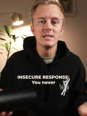A man with blonde hair wears a black hoodie and speaks directly to the camera against a neutral background. Text overlayed on the image reads 'INSECURE RESPONSE: You never'.
