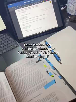 The image shows a desk setup for studying with a laptop and tablet. On the desk are an open textbook with blue highlighting, a pen, and a tablet displaying text. The lighting appears to be from an overhead source, and the composition suggests a study environment. Text is overlaid on the image.