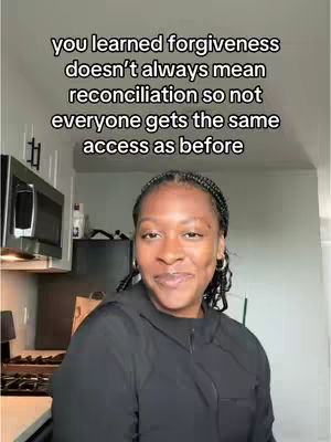 The cover image shows a woman with dark skin smiling at the camera, likely in a kitchen setting. Text overlayed on the image reads a message about forgiveness and reconciliation in relationships. The lighting appears to be natural, and the composition is a medium shot focusing on the woman.