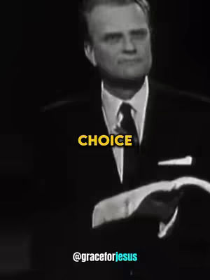 A black and white image of a man in a suit and tie speaking. The word "CHOICE" is overlaid in yellow.