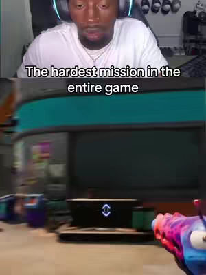 The cover image is split into two sections. The top part of the image is a selfie of a black man wearing a white t-shirt and a gaming headset, looking towards the viewer. The bottom part of the image displays a blurred setting from a video game.