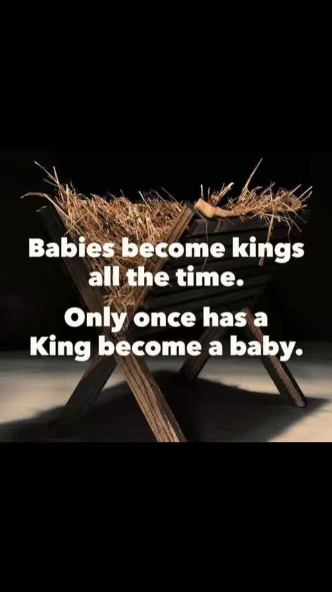 The image shows a wooden manger with straw inside, set against a dark background. White text overlays the manger, stating 'Babies become kings all the time. Only once has a King become a baby.'