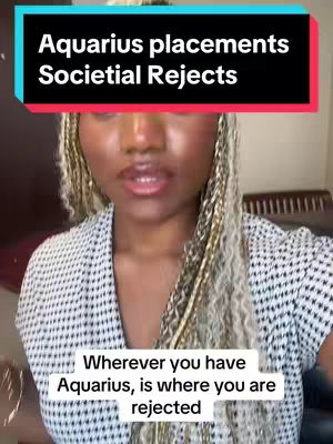 A woman with a neutral expression appears on the cover image, framed from the chest up. She has long, wavy blonde hair with dark-toned strands, and her skin has a warm tone. She is wearing a black and white patterned collared shirt. Above her head, a black bar with white text reads "Aquarius placements Societal Rejects." Below her, a white bar with the text "Wherever you have Aquarius, is where you are rejected" is visible.