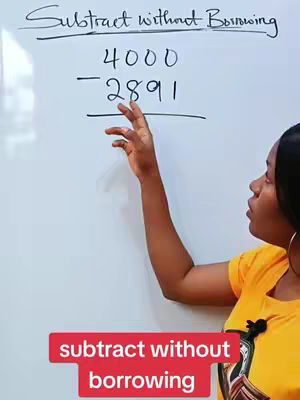 The cover image shows a woman standing near a whiteboard. The whiteboard displays a math problem involving subtraction. The woman appears to be explaining the problem, with her right hand raised. Below, there is a red rectangular box with the text 'subtract without borrowing'. The background is a light colored wall.