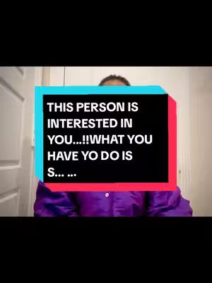 A person is centered in the frame, with their face obscured. A superimposed rectangular box has text in black that says "THIS PERSON IS INTERESTED IN YOU...!!WHAT YOU HAVE YO DO IS S... ...". The box has a light blue border around black text and rests on a red rectangle at the top and bottom. The person is wearing a purple shirt, partially visible, and the background seems to be a white door and interior.