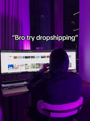 The cover image shows a person sitting in a dark room in front of a computer. The person wears a hoodie and is viewed from the back. The computer screen displays a webpage, and text overlayed on the image reads "Bro try dropshipping". Purple light illuminates the room.