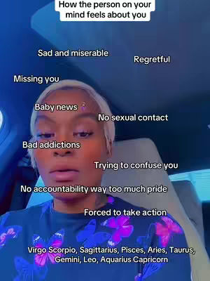 The cover image features a woman's face angled slightly to the side with text overlays describing how someone on your mind feels about you. The woman is fair-skinned, with short, light-colored hair and a neutral expression. She is wearing a dark top. Various phrases such as 'Sad and miserable', 'Missing you', and 'Baby news' are positioned around her head, connected by lines. The background appears to be the inside of a vehicle. Text at the bottom lists zodiac signs.