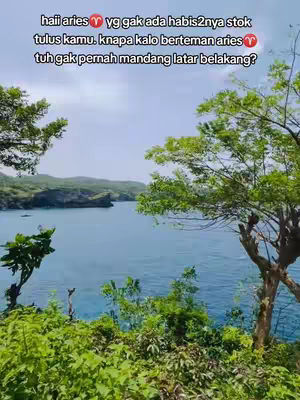 The cover image shows a scenic view of a clear blue sea and sky with lush green foliage in the foreground. In the middle ground, a body of water meets the sky. The image has text in the upper part.