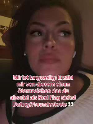 The cover image is a close-up selfie of a woman with dark hair and fair skin. She appears to be lit by soft lighting, perhaps indoors. The image focuses on her face without showing much of the background. Overlaid on the image is text in a vibrant red font.