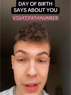 The cover image shows a close-up of a young man's face, with the text, 'DAY OF BIRTH SAYS ABOUT YOU VS LIFE PATH NUMBER', overlayed at the top. The man is centered, looking towards the camera with a neutral expression. He has short, textured hair, and is wearing a silver chain necklace. He is positioned in front of a plain background.