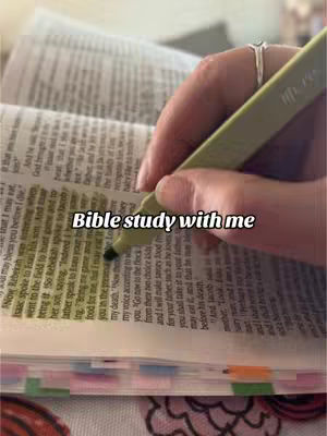 The image shows a close-up of a hand holding a yellow highlighter, highlighting text in an open Bible. The text 'Bible study with me' is overlaid on the image. The hand has a ring and the pages are marked with colorful tabs.