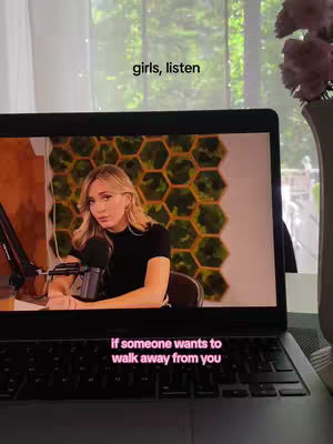 A laptop displaying a woman talking in a podcast setting is at the center. The text overlay reads 'girls, listen' at the top and 'if someone wants to walk away from you' at the bottom. The image is set against the background of a window with green outside visible.