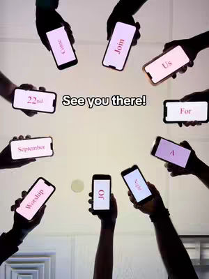 A low-angle shot shows multiple hands holding smartphones in a circle, with various words displayed on the screens. The background appears to be a plain wall or surface. The overall composition creates a sense of community or gathering.