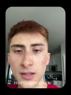 The cover image features a close-up shot of a young man's face against a blurred background. He has short, reddish-brown hair, fair skin with freckles, and is looking slightly downward. The setting appears to be indoors, with hints of a kitchen visible in the background. The framing is a medium shot, focusing on his face and upper chest.