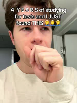 A young man is close to the camera, looking surprised and covering his mouth with his hand. Text overlayed reads, '4 YEARS of studying for tests and I JUST found THIS' with three emoji of thinking faces.